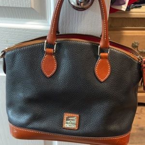 Dooney and Bourke hand bag. Slightly used. Black and brown
